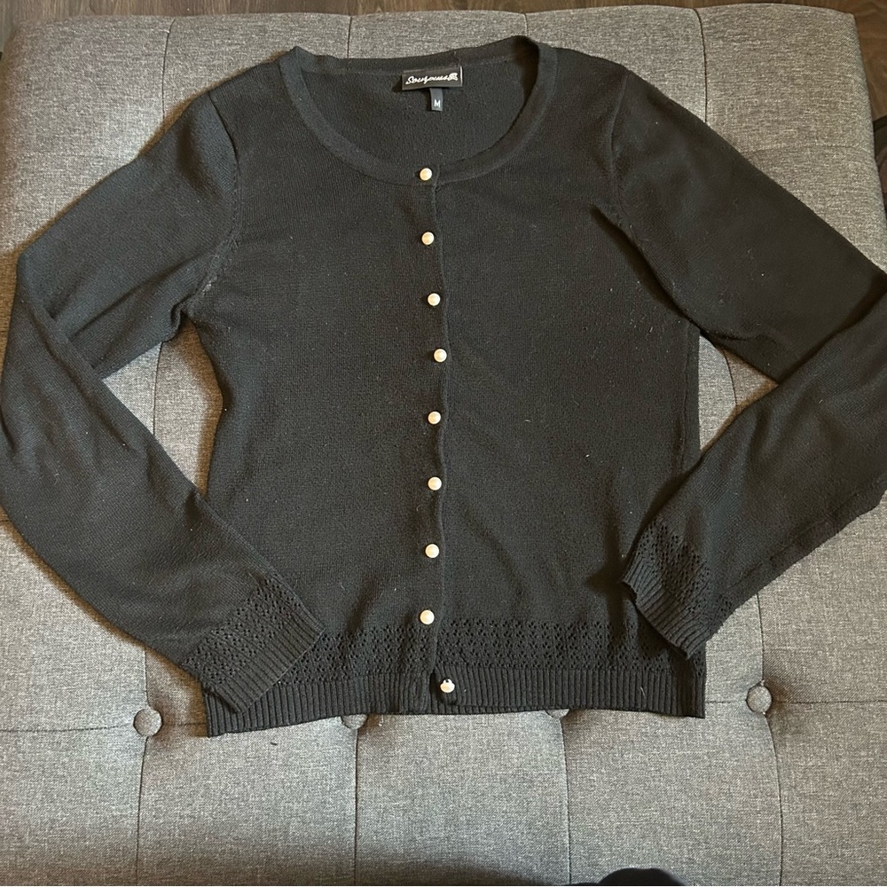 Sourpuss Black Cardigan Sweater with patterned trim and pearl buttons